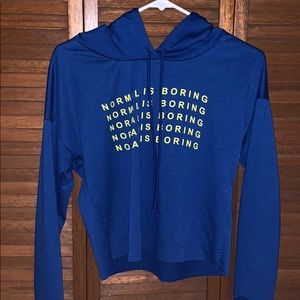 Blue lettered cropped sweatshirt.